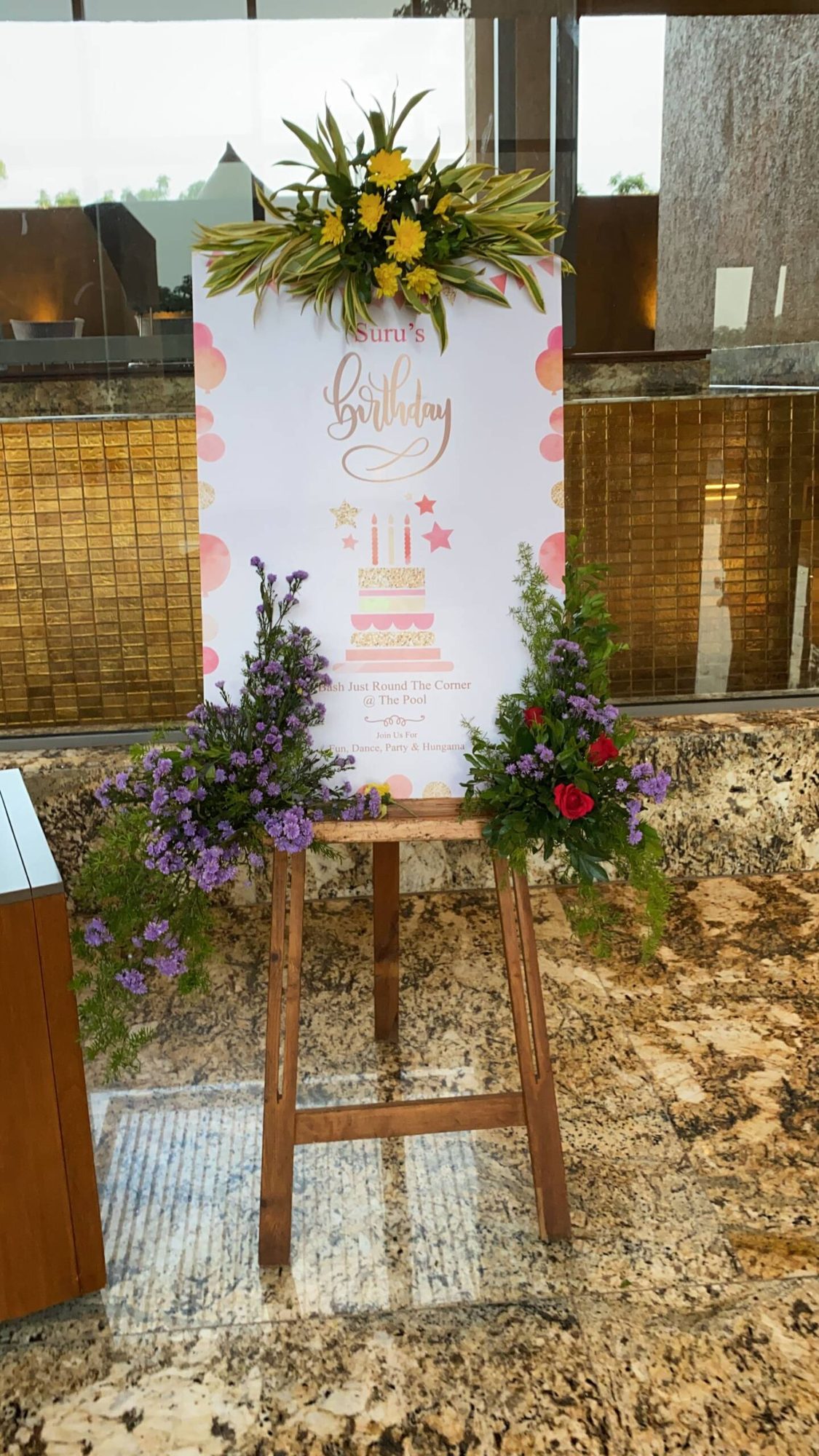 Welcome board with floral décor