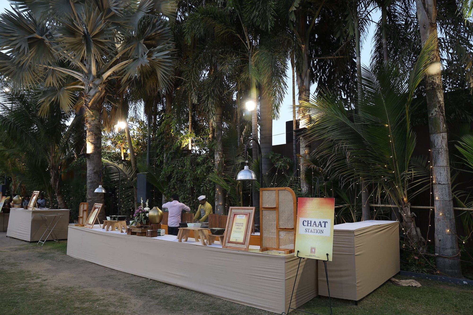 Buffet counter beneath palms